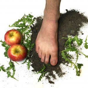 One of our feet and some ashes, representing the carbon footprint of off-season and non-local produce.